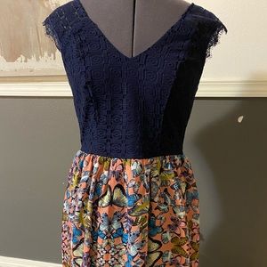NEW. Knee length butterfly lace dress size medium